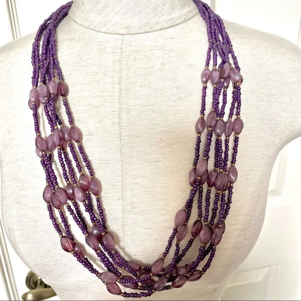Long purple multi strand beaded necklace